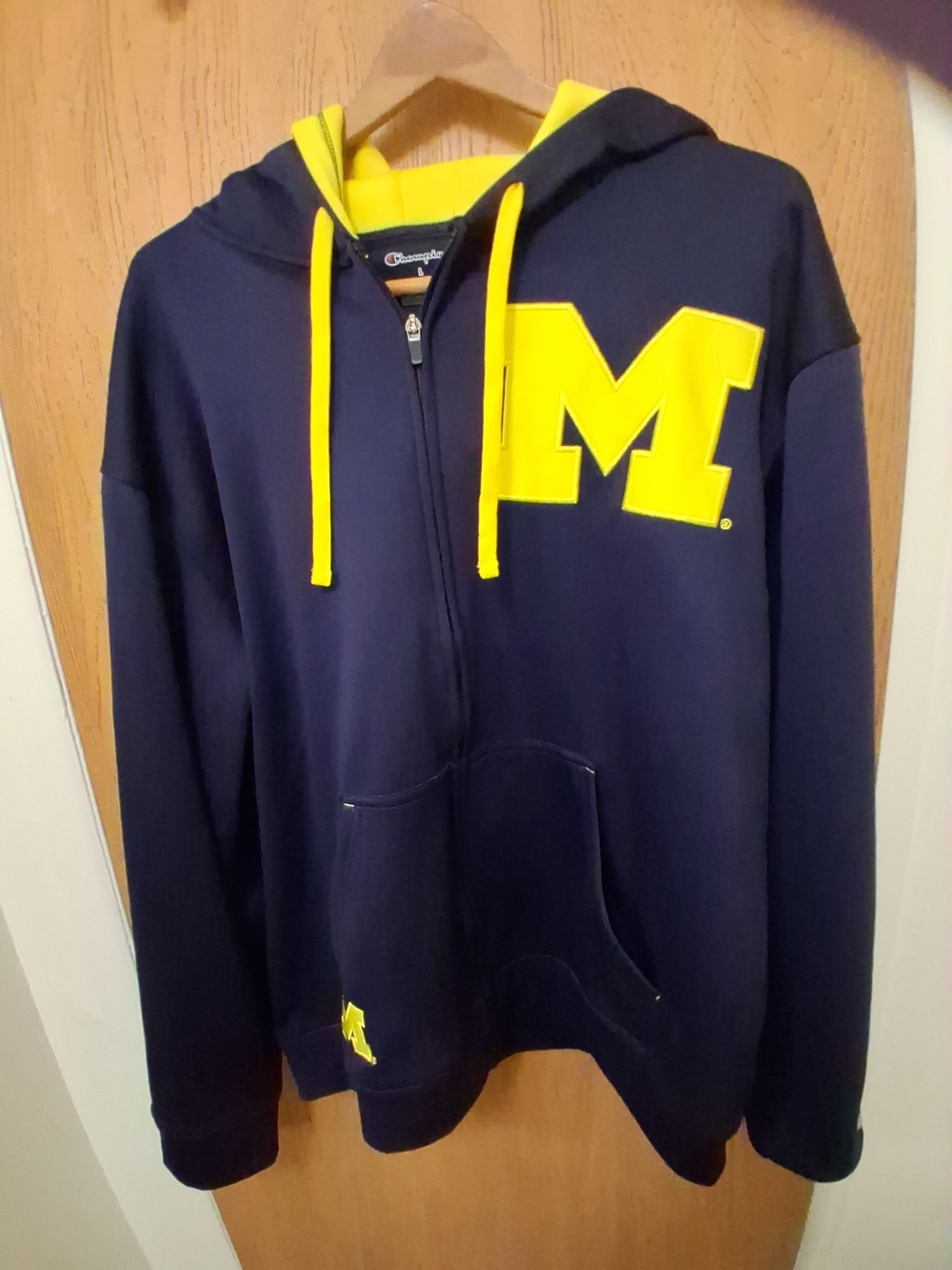 Champion Navy Full-Zip Hoodie with Yellow 'M' Logo and Drawstrings